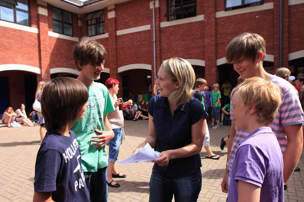 %_tempFileNameteignmouth-campus-staff-explaining-students-5%
