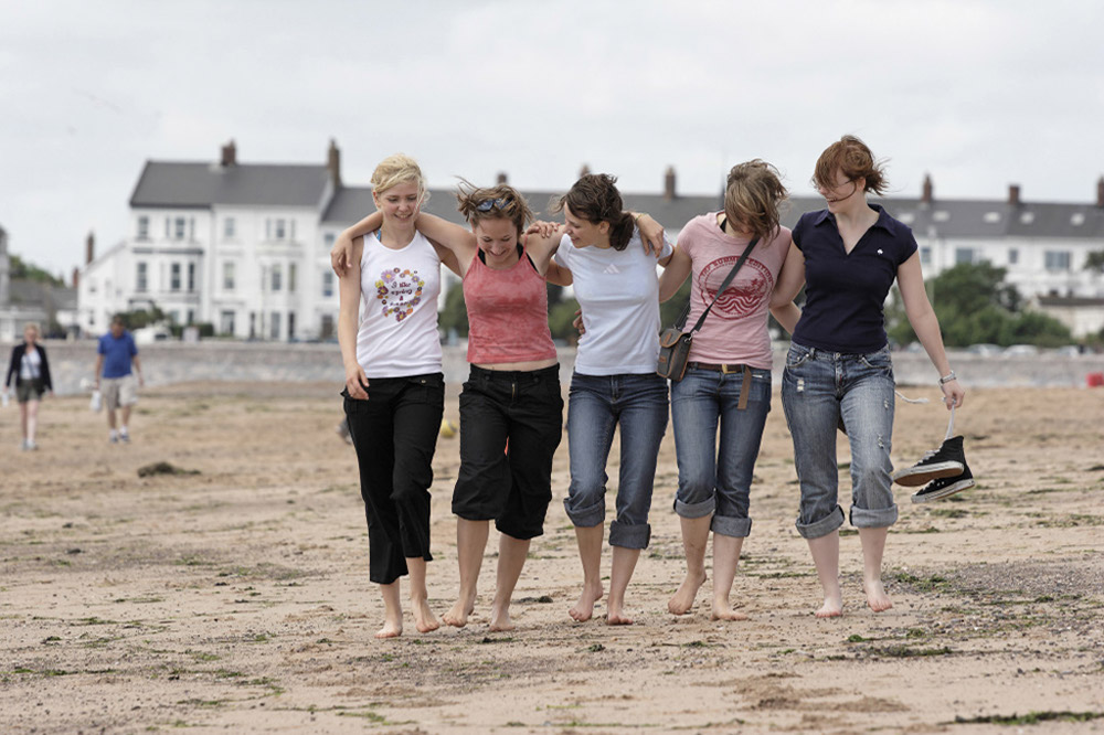 %_tempFileNamewalking-at-beach-2%