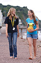 %_tempFileNamegirl-with-staff-at-the-beach-12%