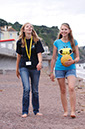 %_tempFileNamegirl-with-staff-at-the-beach-14%
