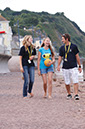 %_tempFileNamegirl-with-staff-at-the-beach-5%