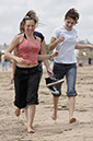 %_tempFileNamerunning-girl-at-beach%