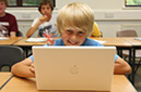 %_tempFileNameboy-with-computer-1%