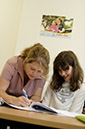 %_tempFileNamegirl-with-teacher%