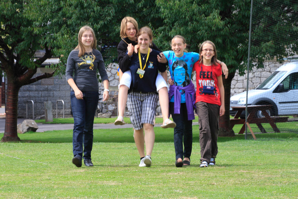 %_tempFileNamewalking-girls-with-staff-2%