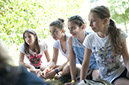 %_tempFileNamesitting-girls-1%
