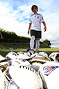 %_tempFileNameboy-with-many-footballs-2%